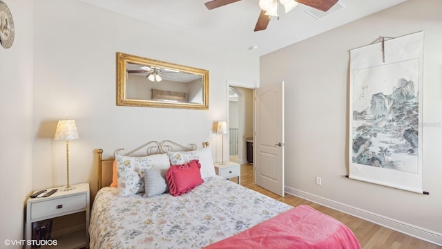 bedroom featuring ceiling fan and light wood-type flooring