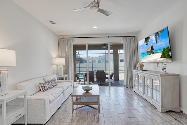 living room with ceiling fan