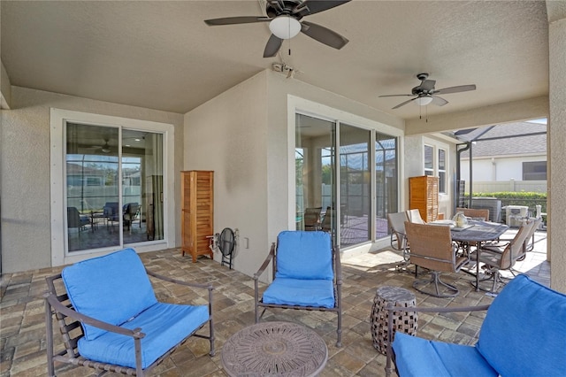 view of patio / terrace featuring ceiling fan