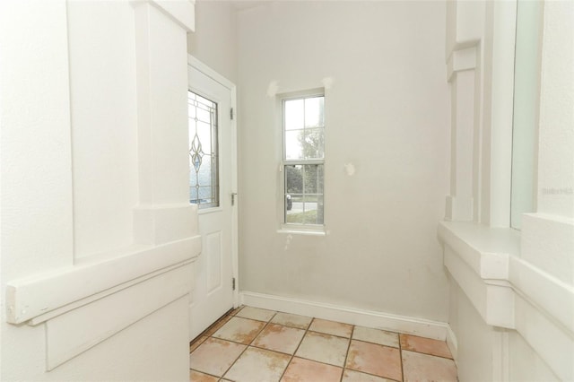 interior space featuring light tile patterned flooring