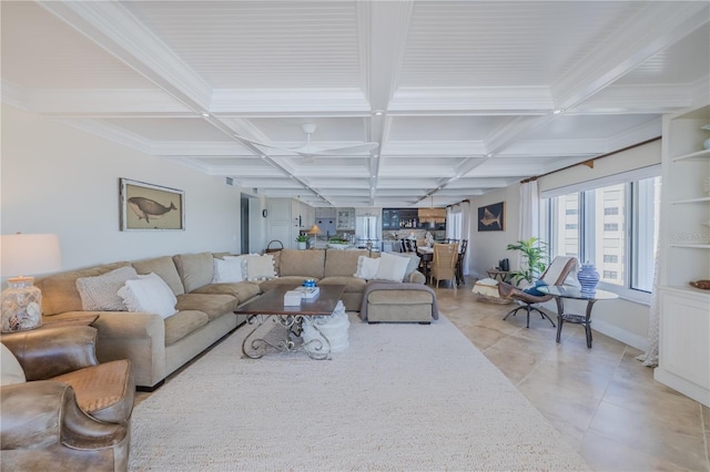 living room with beamed ceiling, light tile patterned flooring, coffered ceiling, and ornamental molding