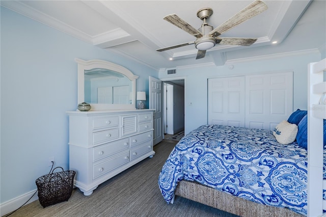 bedroom featuring coffered ceiling, ceiling fan, crown molding, beam ceiling, and a closet