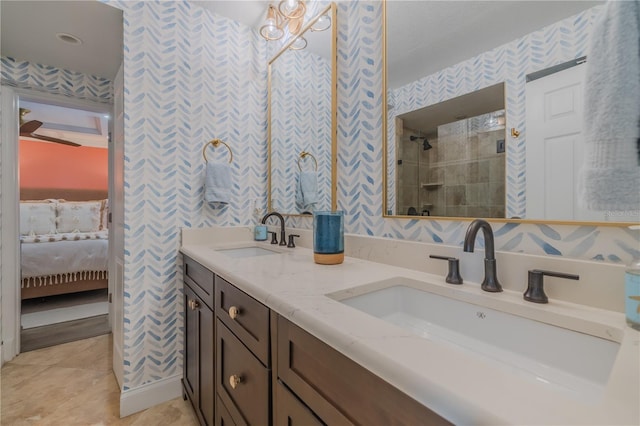 bathroom featuring tile patterned flooring and vanity