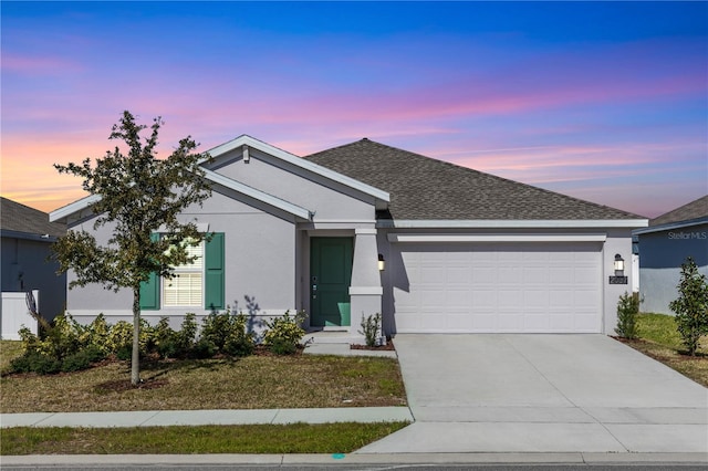 single story home featuring a garage