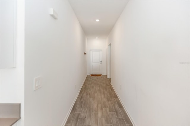 corridor featuring light hardwood / wood-style flooring