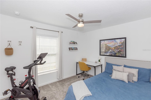 bedroom featuring ceiling fan, light carpet, and multiple windows