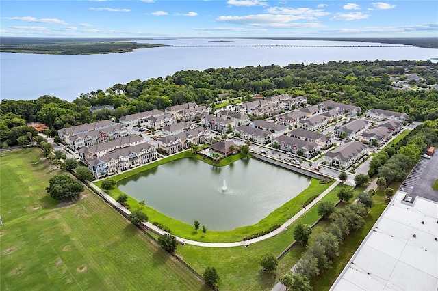 drone / aerial view with a water view