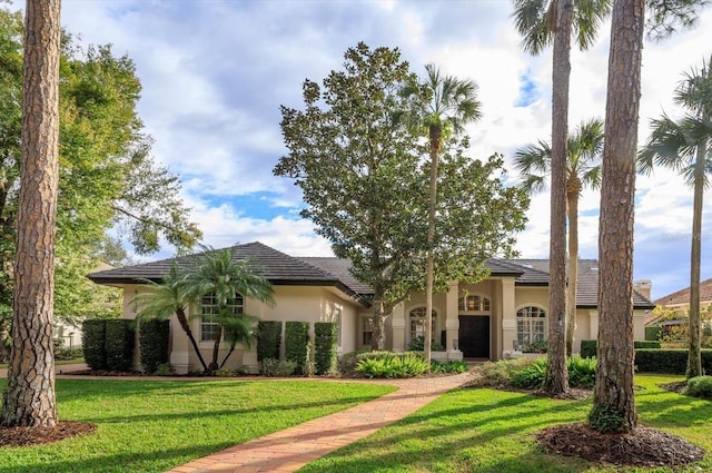 view of front of home with a front yard