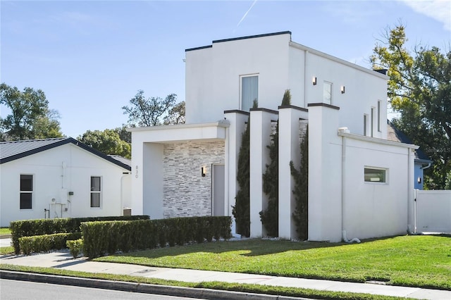 exterior space featuring a front lawn