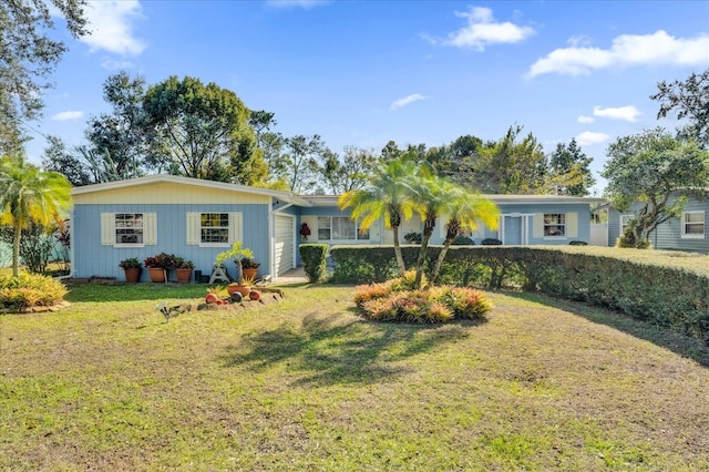 ranch-style home with a front yard