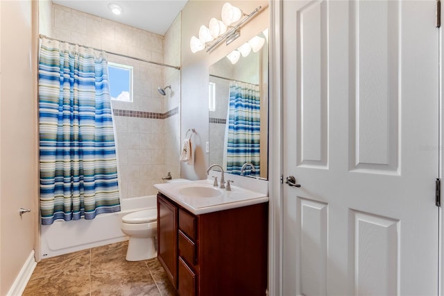 full bathroom featuring shower / bath combo with shower curtain, vanity, and toilet