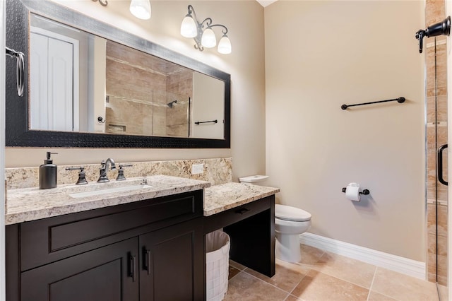 bathroom featuring vanity, toilet, and walk in shower