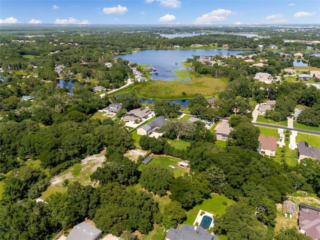 drone / aerial view with a water view