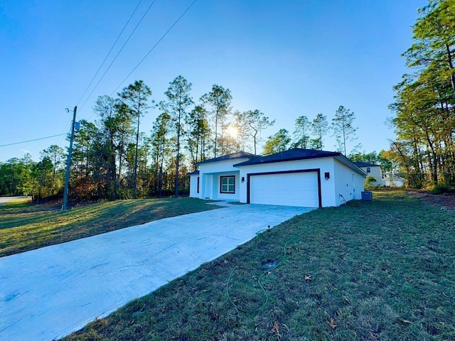 garage with a lawn