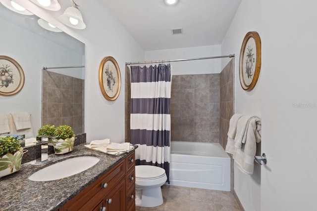 full bathroom featuring shower / tub combo with curtain, vanity, tile patterned flooring, and toilet