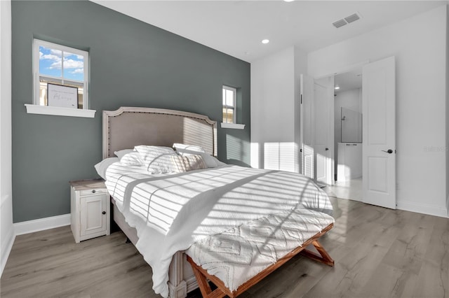 bedroom featuring light hardwood / wood-style flooring