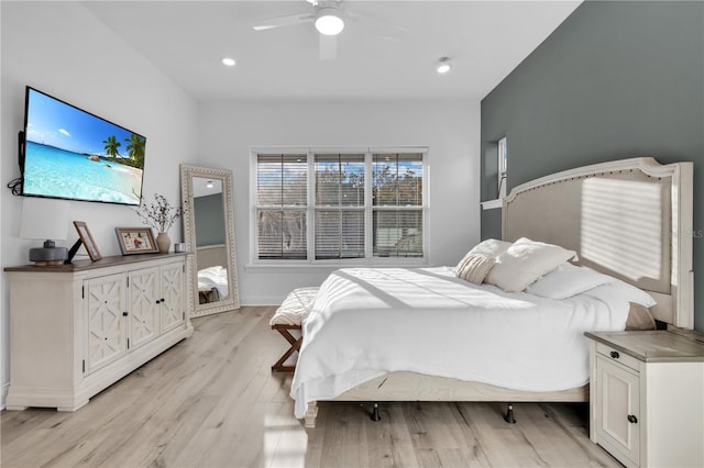 bedroom featuring ceiling fan and light hardwood / wood-style floors