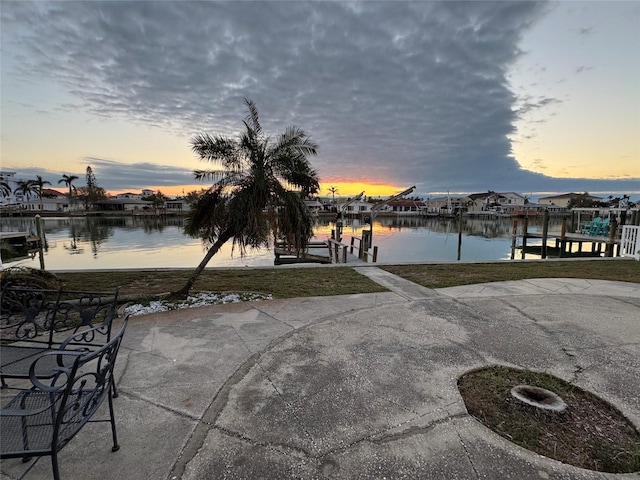 view of dock with a water view