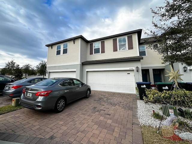 view of front of property featuring a garage