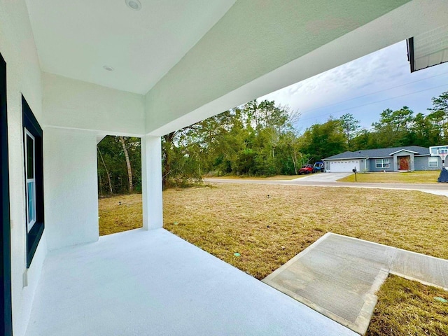 view of yard featuring a garage