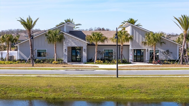 exterior space with a water view