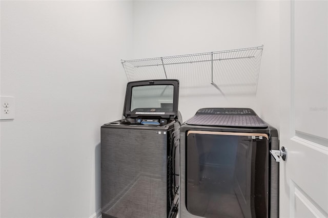 laundry area with washer and dryer