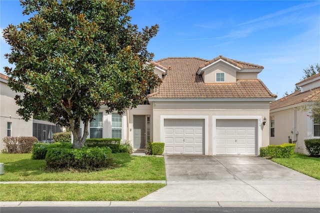 view of front of house with a front yard and a garage