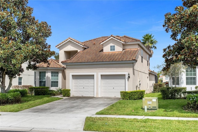 mediterranean / spanish-style home featuring a front yard and a garage