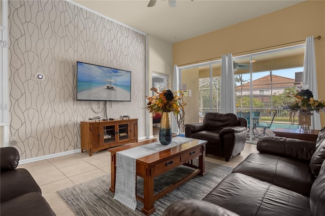 tiled living room with ceiling fan