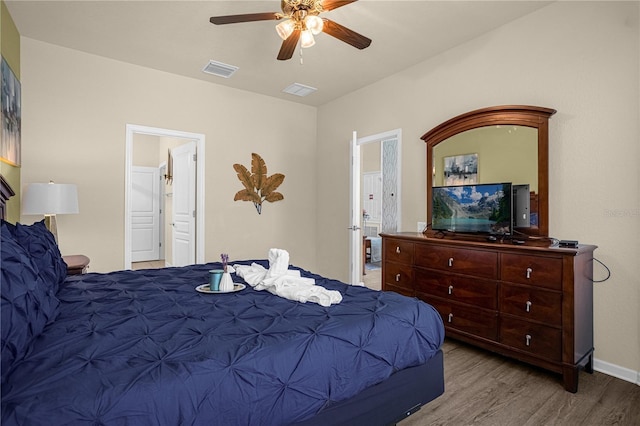 bedroom featuring ceiling fan and wood-type flooring