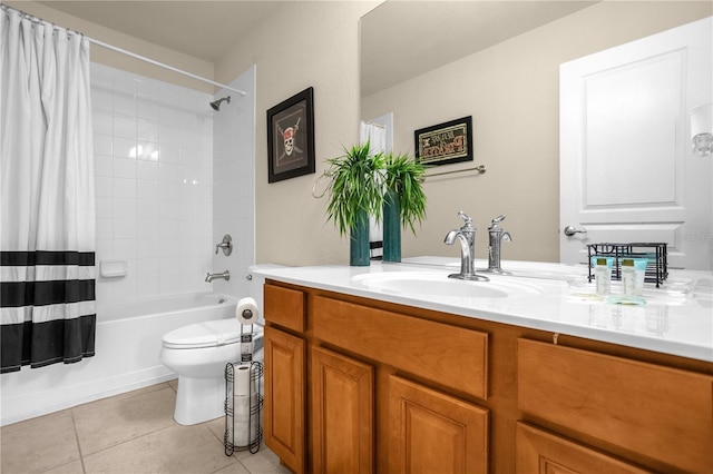 full bathroom featuring tile patterned floors, shower / bath combo, toilet, and vanity