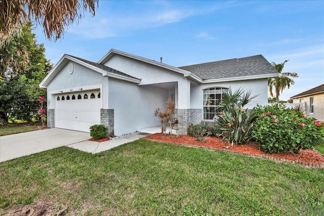 ranch-style home with a front yard and a garage