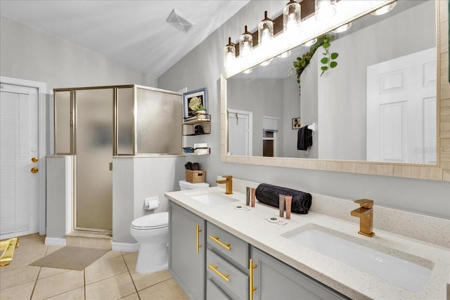 bathroom featuring lofted ceiling, an enclosed shower, vanity, tile patterned floors, and toilet