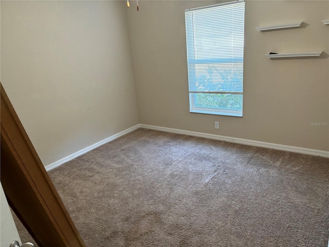 view of carpeted spare room