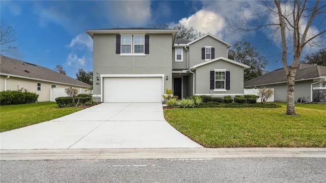 front of property with a front yard and a garage