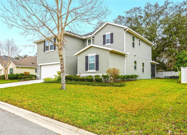 view of front facade featuring a garage and a front lawn