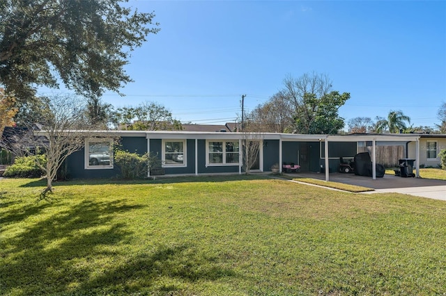 ranch-style home with a front lawn and a carport