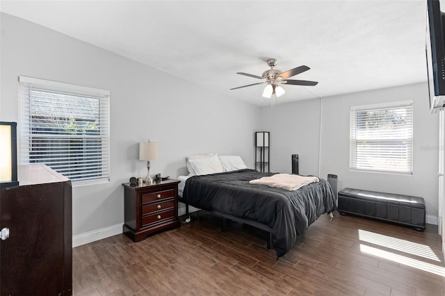 bedroom featuring ceiling fan and dark hardwood / wood-style flooring