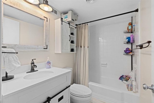 full bathroom featuring toilet, vanity, and shower / tub combo