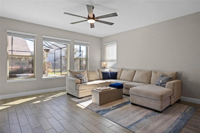 living room featuring ceiling fan