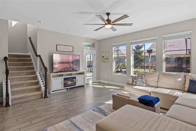 living room with ceiling fan