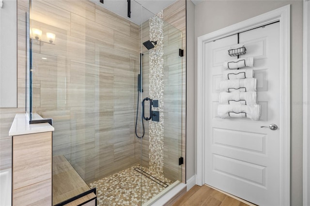 bathroom featuring an enclosed shower