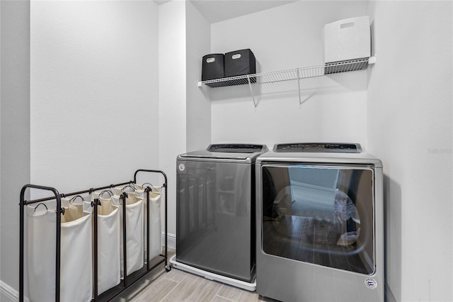 laundry area featuring washing machine and dryer