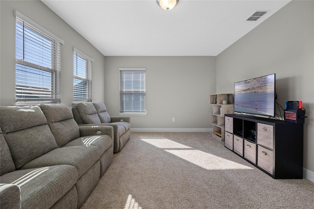 living room with light colored carpet