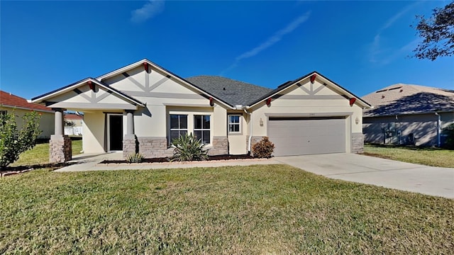 craftsman house featuring a front yard and a garage