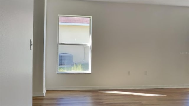 spare room featuring light hardwood / wood-style flooring