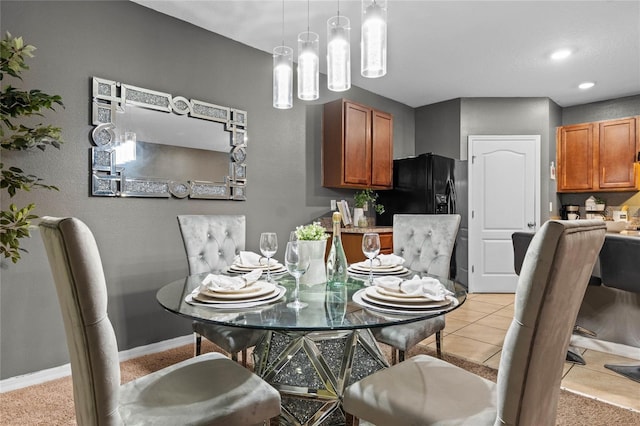 dining room featuring light tile patterned flooring