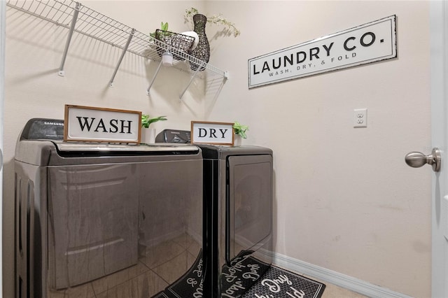 laundry room featuring independent washer and dryer