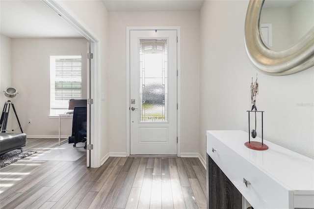 doorway to outside featuring light hardwood / wood-style flooring