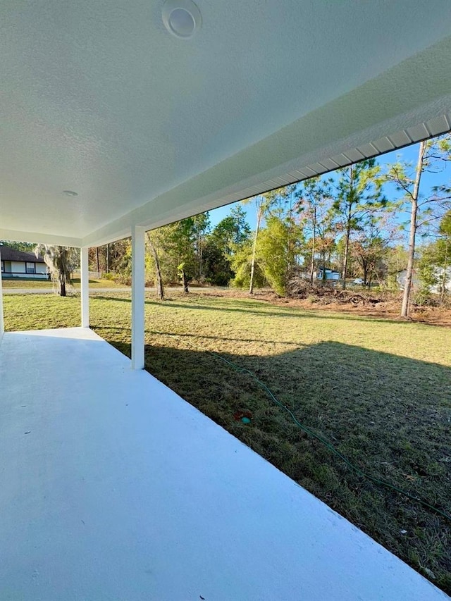 view of yard with a patio area